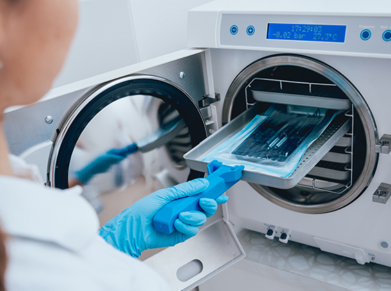 Doctor using autoclave